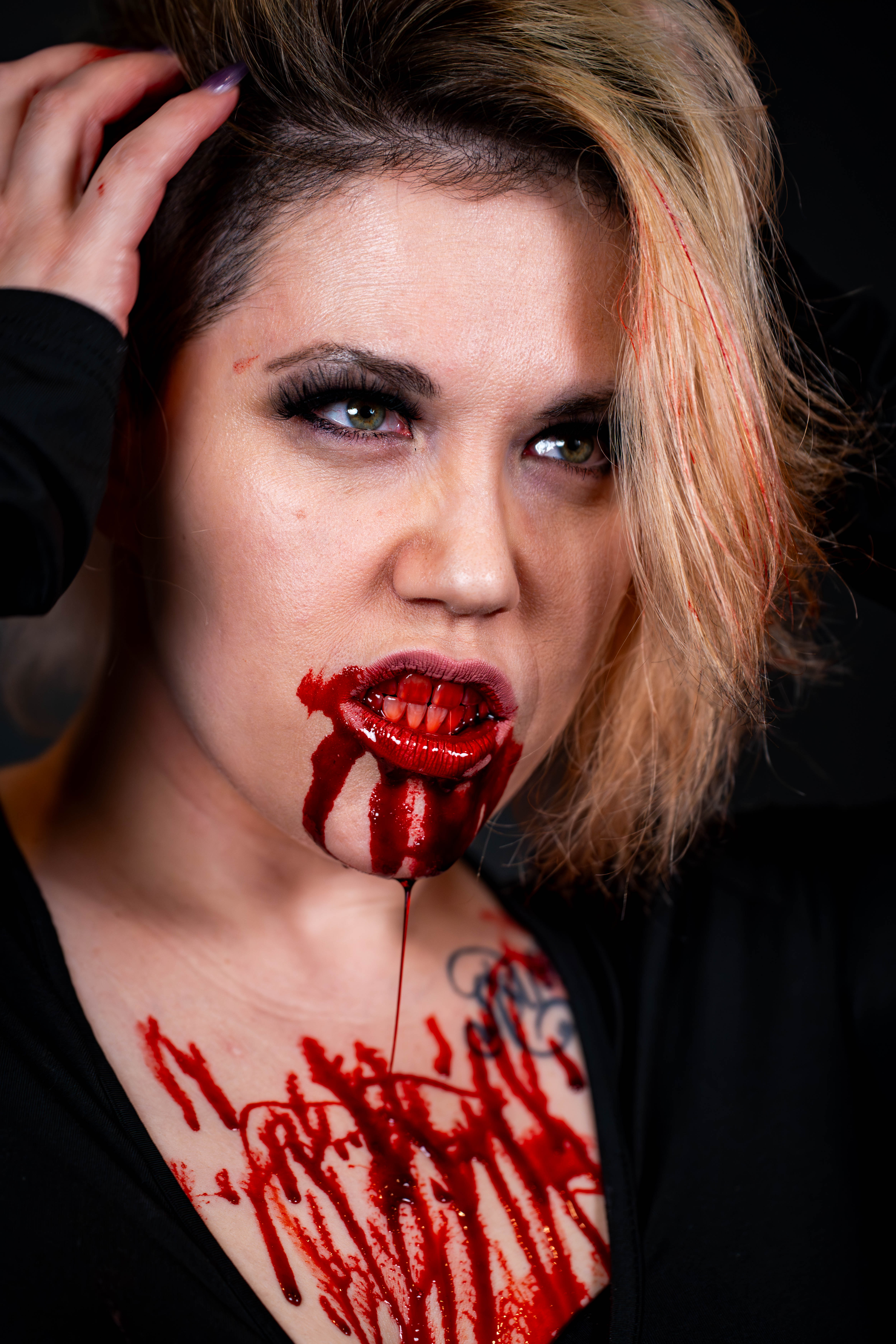 Vampire SFX makeup portrait with dripping blood — horror editorial at Starfall Studios